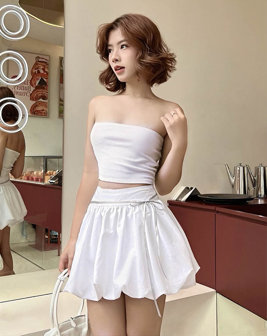 Chân váy ngắn tùng bí thắt nơ - Image 1
