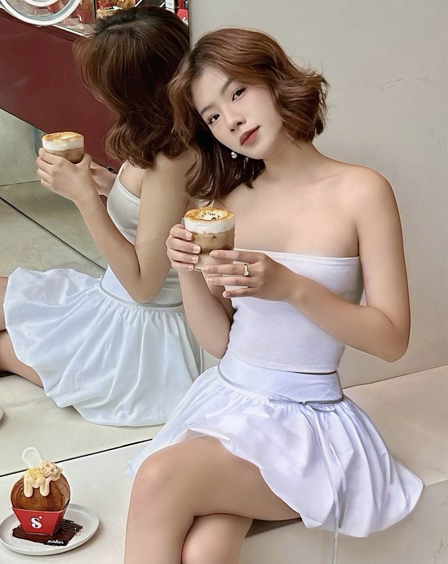 Chân váy ngắn tùng bí thắt nơ - Image 4
